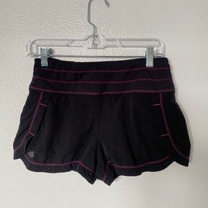 Black Athleta running shorts